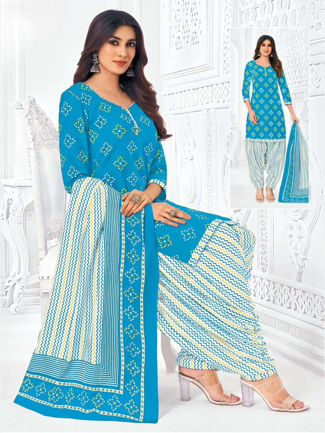 A model wearing a blue and white printed cotton Patiala suit, consisting of a salwar kameez and matching dupatta.